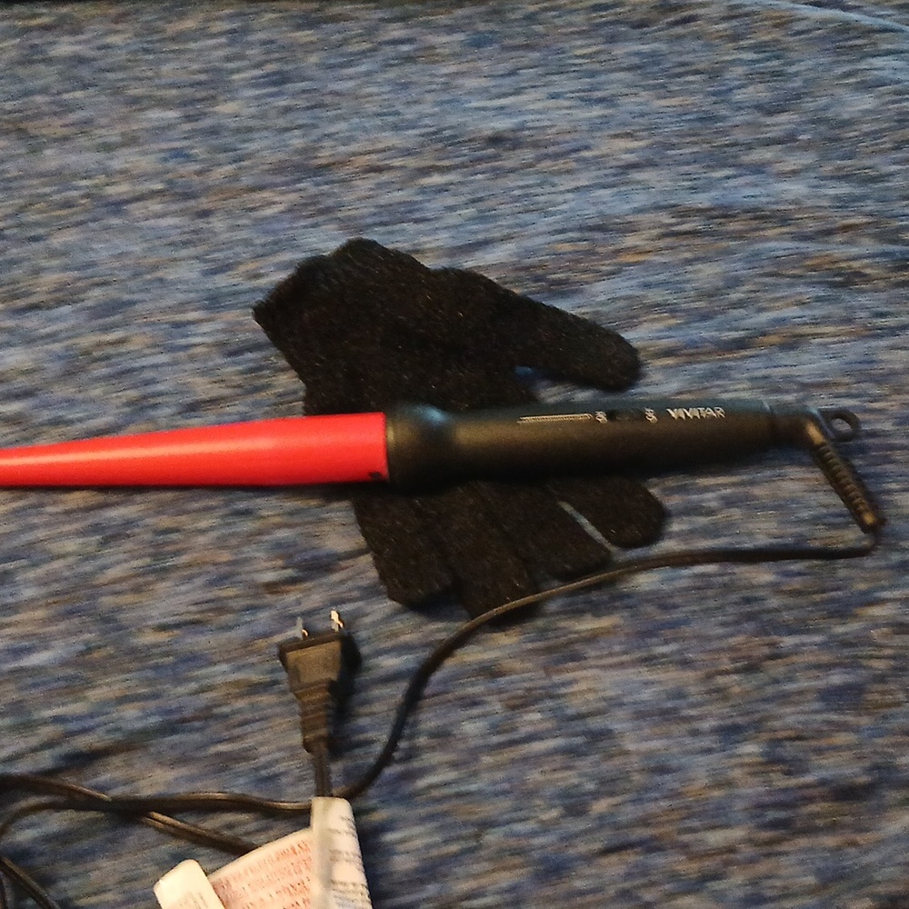 A  new Vivitar hair curler